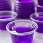 Colorful Purple Hooter jello shots served in clear cups